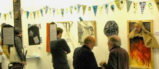 people looking at exhibitionin Stamford Arts Centre