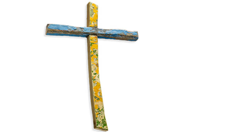 wooden cross made from boat wreckage
