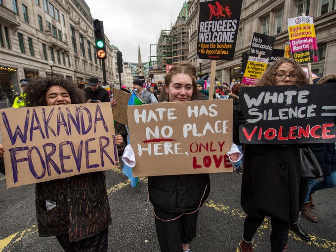 people demonstrating with placards